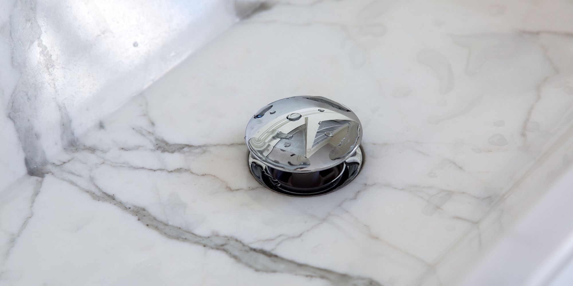 réglage d'un bouchon de lavabo