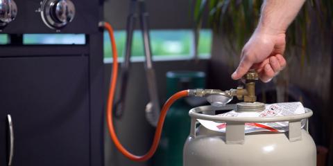 utilisation d'une bouteille de gaz à l'extérieur pour un barbecue