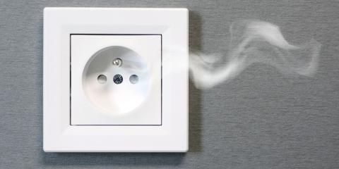 Prise électrique qui fume