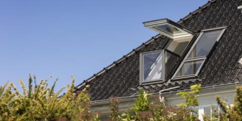 velux balcon sur le toit d'une maison
